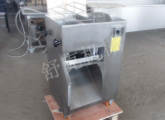 Meat cutting machine